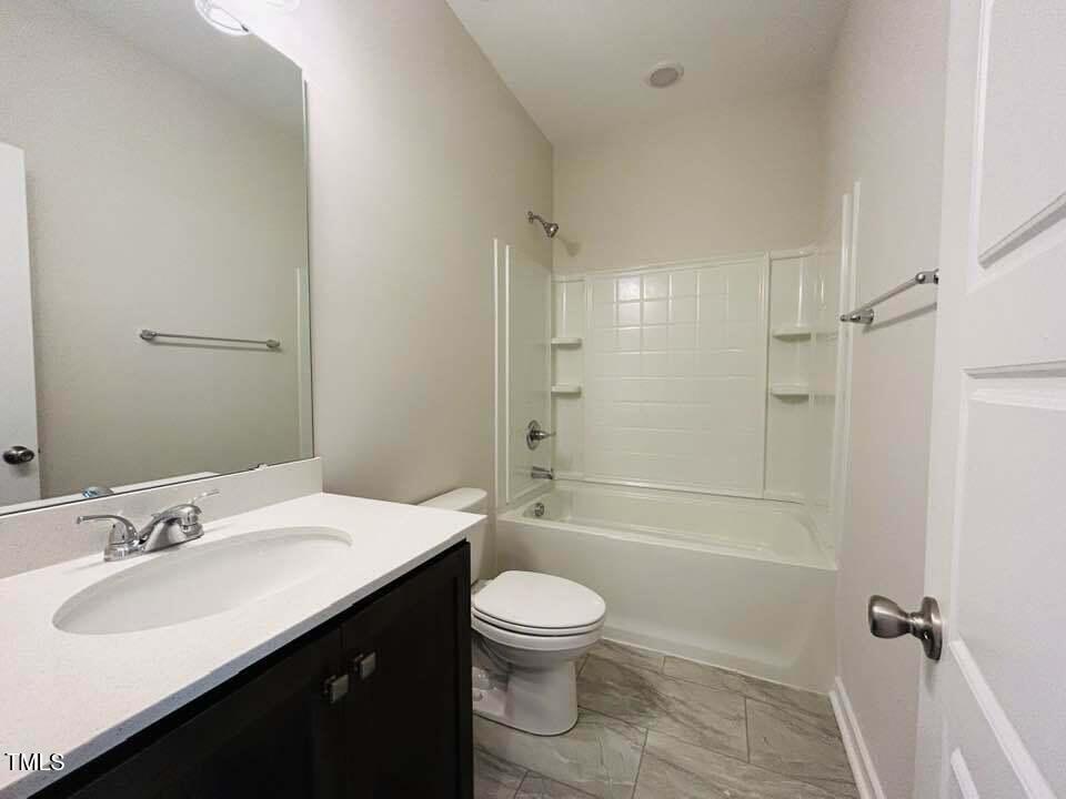 816 Laurel Gate Drive Wake Forest, NC 27587 - Photo 16 of 20 a bathroom with a sink a toilet and shower