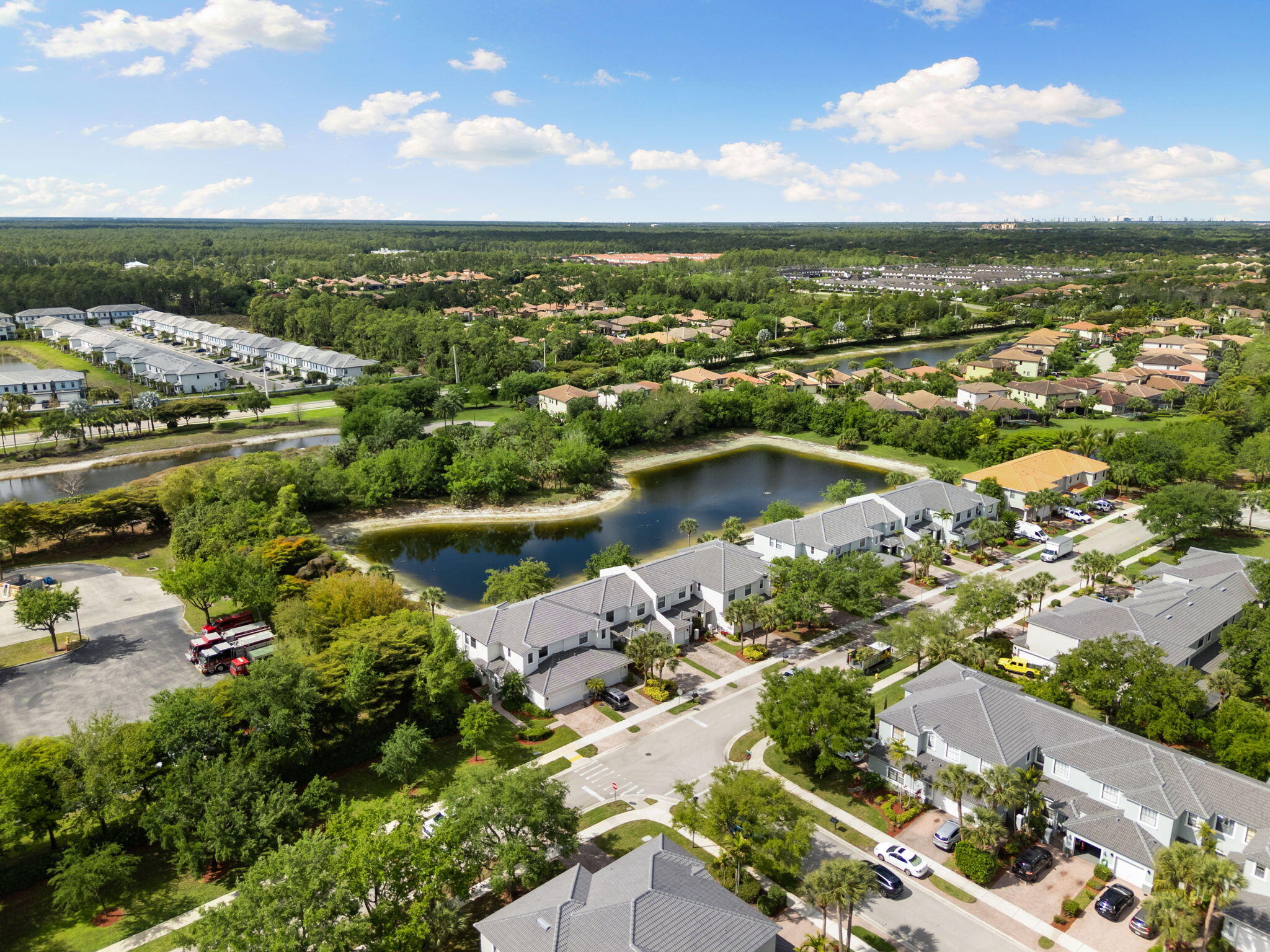 15068 Summit Pl Circle Naples, FL 34119 - Photo 26 of 29 an aerial view of residential houses with outdoor space