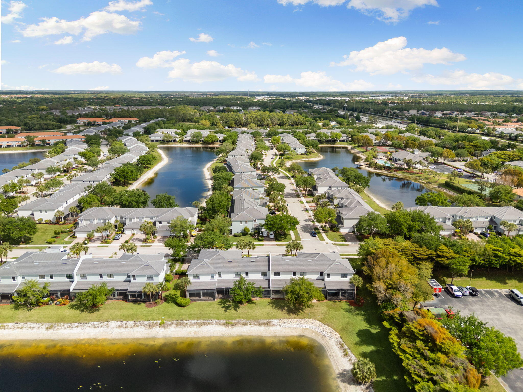 15068 Summit Pl Circle Naples, FL 34119 - Photo 27 of 29 an aerial view of residential houses with outdoor space