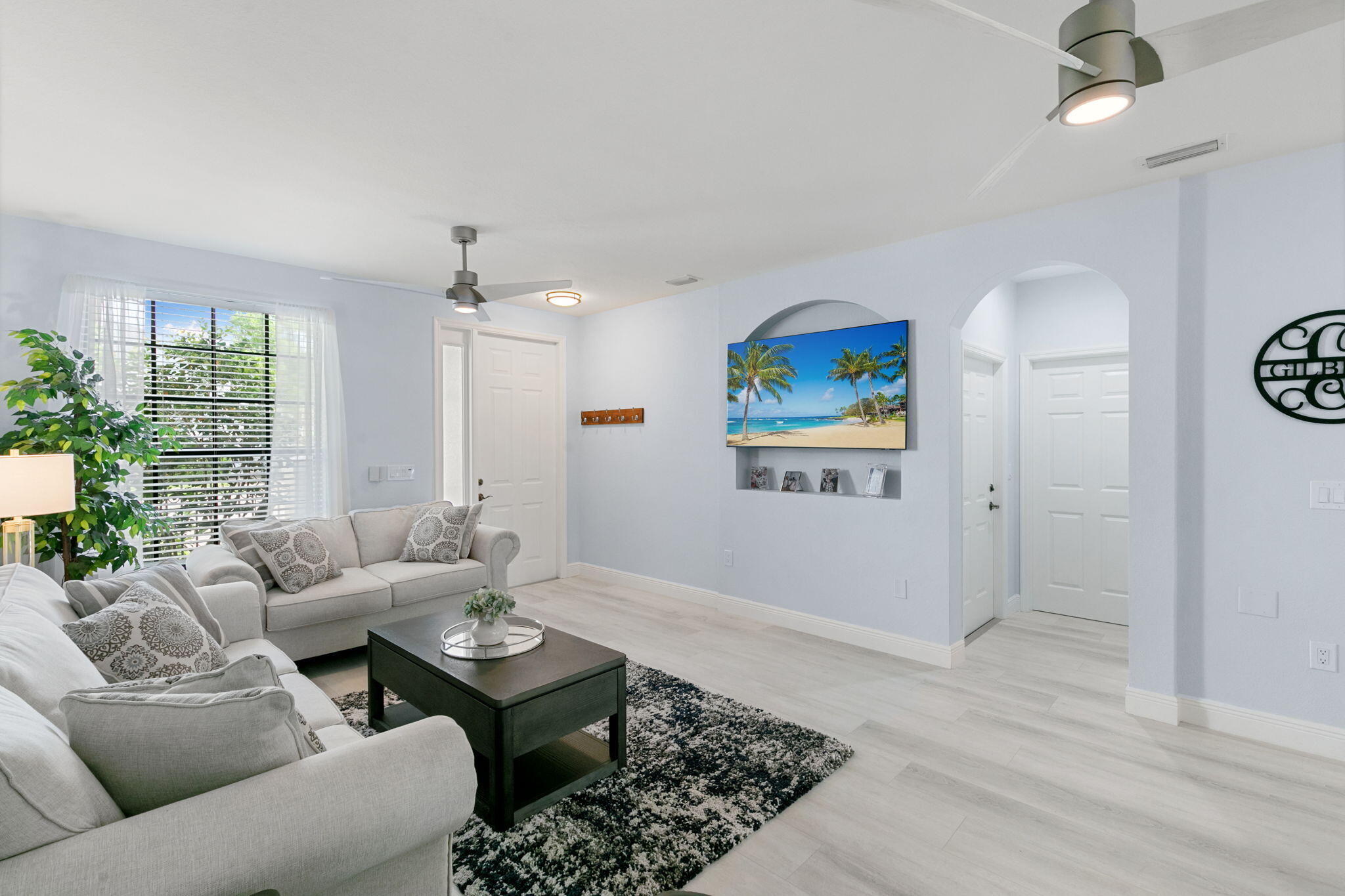 15068 Summit Pl Circle Naples, FL 34119 - Photo 3 of 29 a living room with furniture and a large window