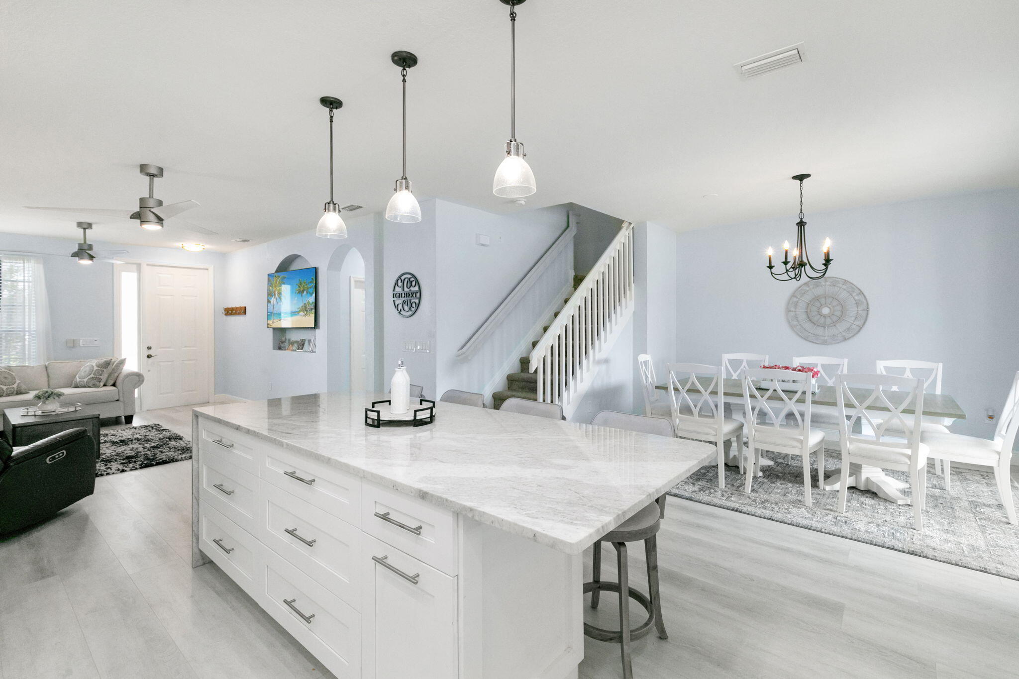 15068 Summit Pl Circle Naples, FL 34119 - Photo 8 of 29 a kitchen with a table and chairs