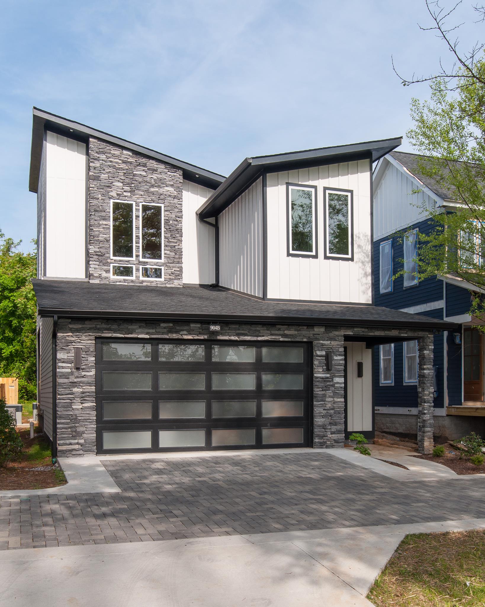 a front view of a house with a garage