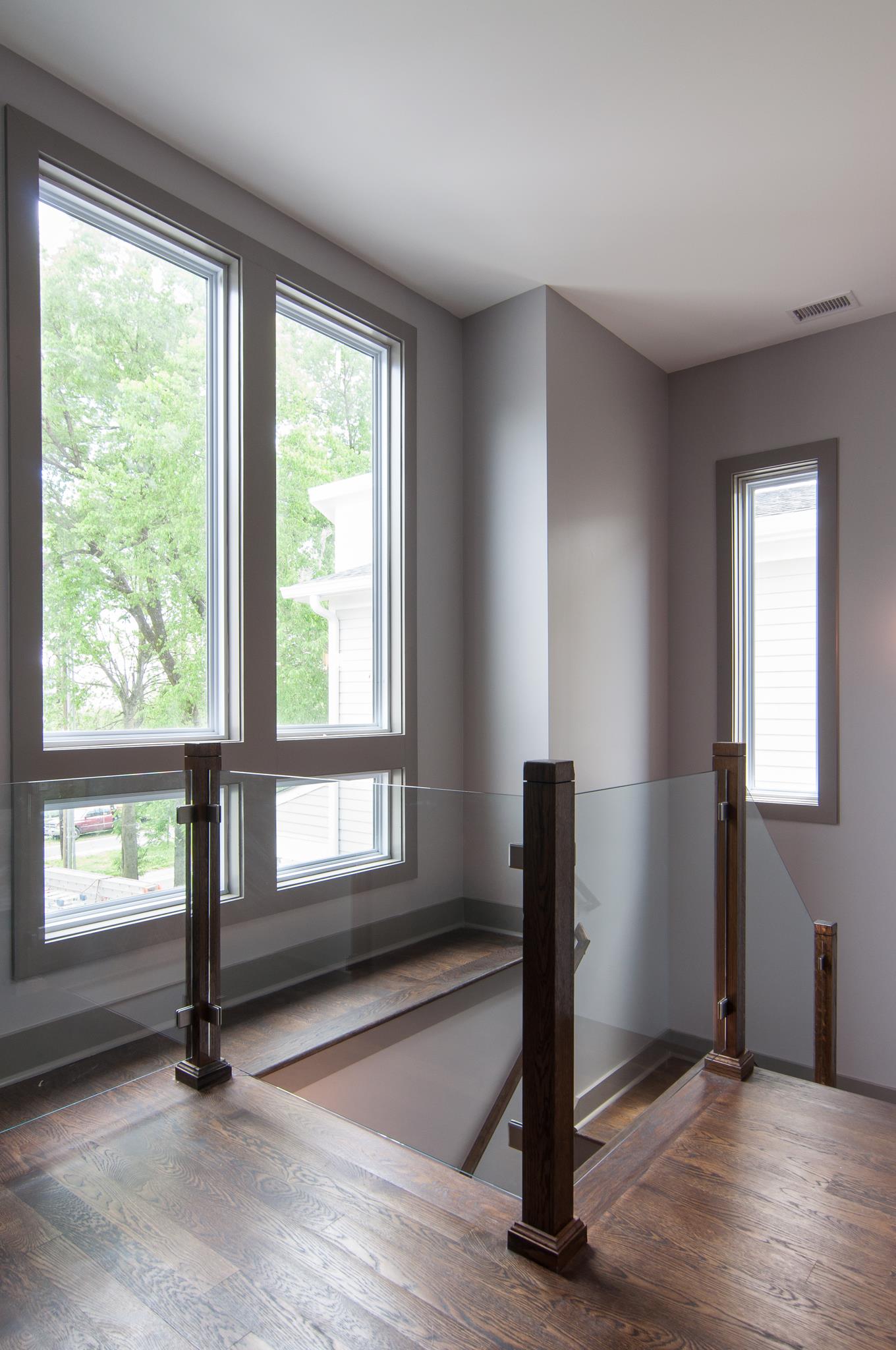 904 B Riverside Drive Nashville, TN 37206 - Photo 17 of 30 a view of an empty room with window wooden floor