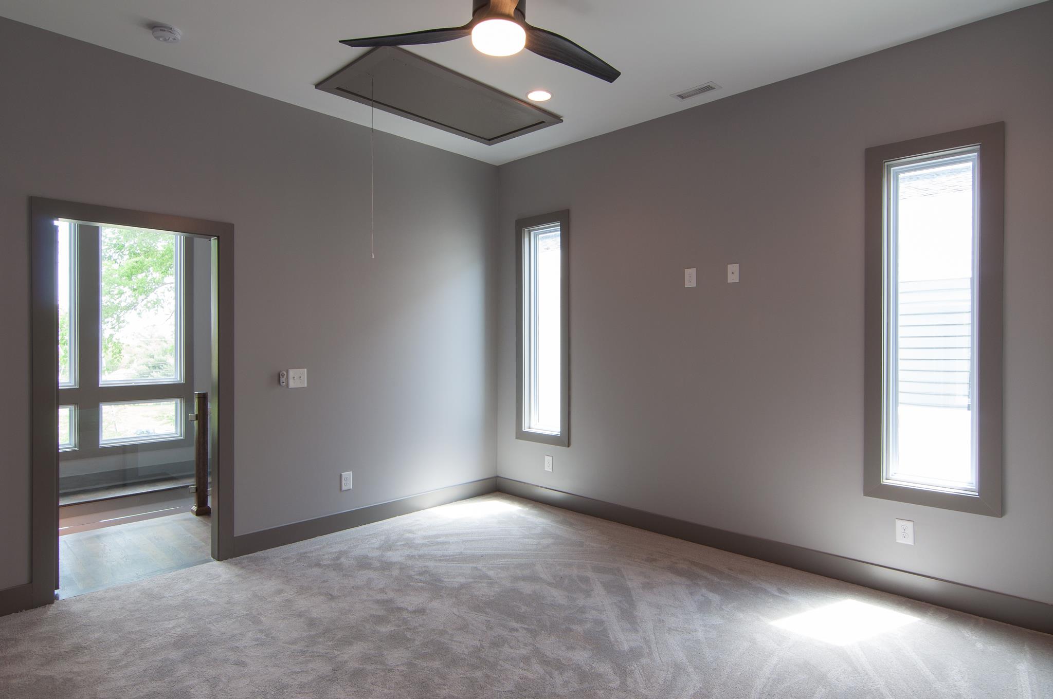 904 B Riverside Drive Nashville, TN 37206 - Photo 19 of 30 an empty room with windows and closet