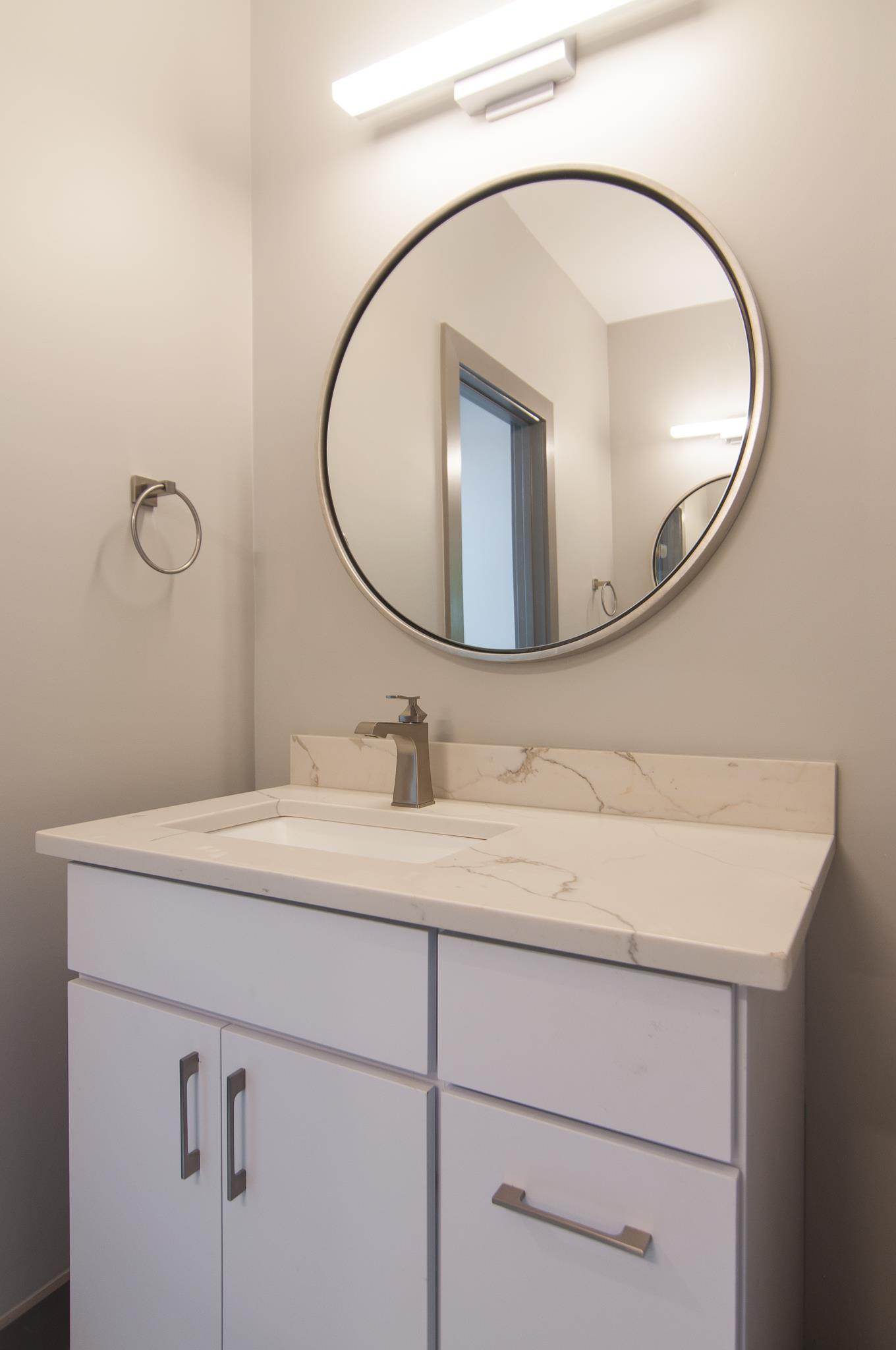 904 B Riverside Drive Nashville, TN 37206 - Photo 21 of 30 a bathroom with a sink and a mirror