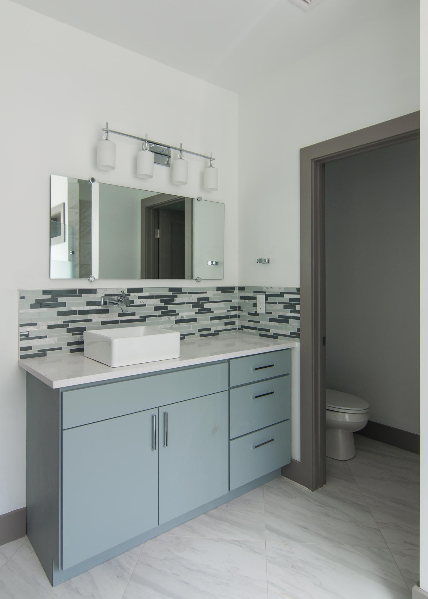904 B Riverside Drive Nashville, TN 37206 - Photo 24 of 30 a bathroom with a sink toilet and mirror