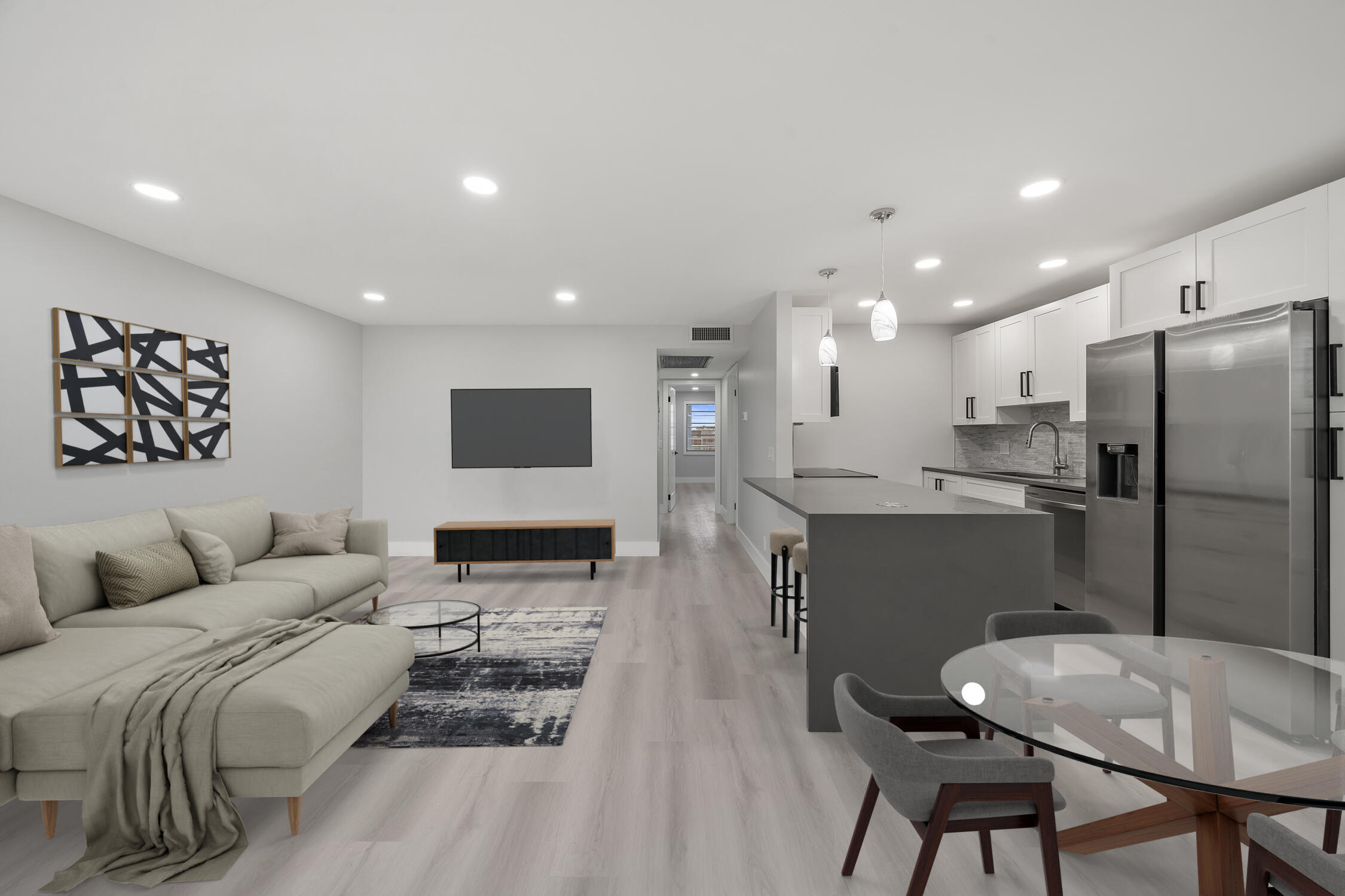 4071 Guildford East Boca Raton, FL 33434 - Photo 6 of 26 4071_Guildford_D_Living_Room_&_Kitchen_S