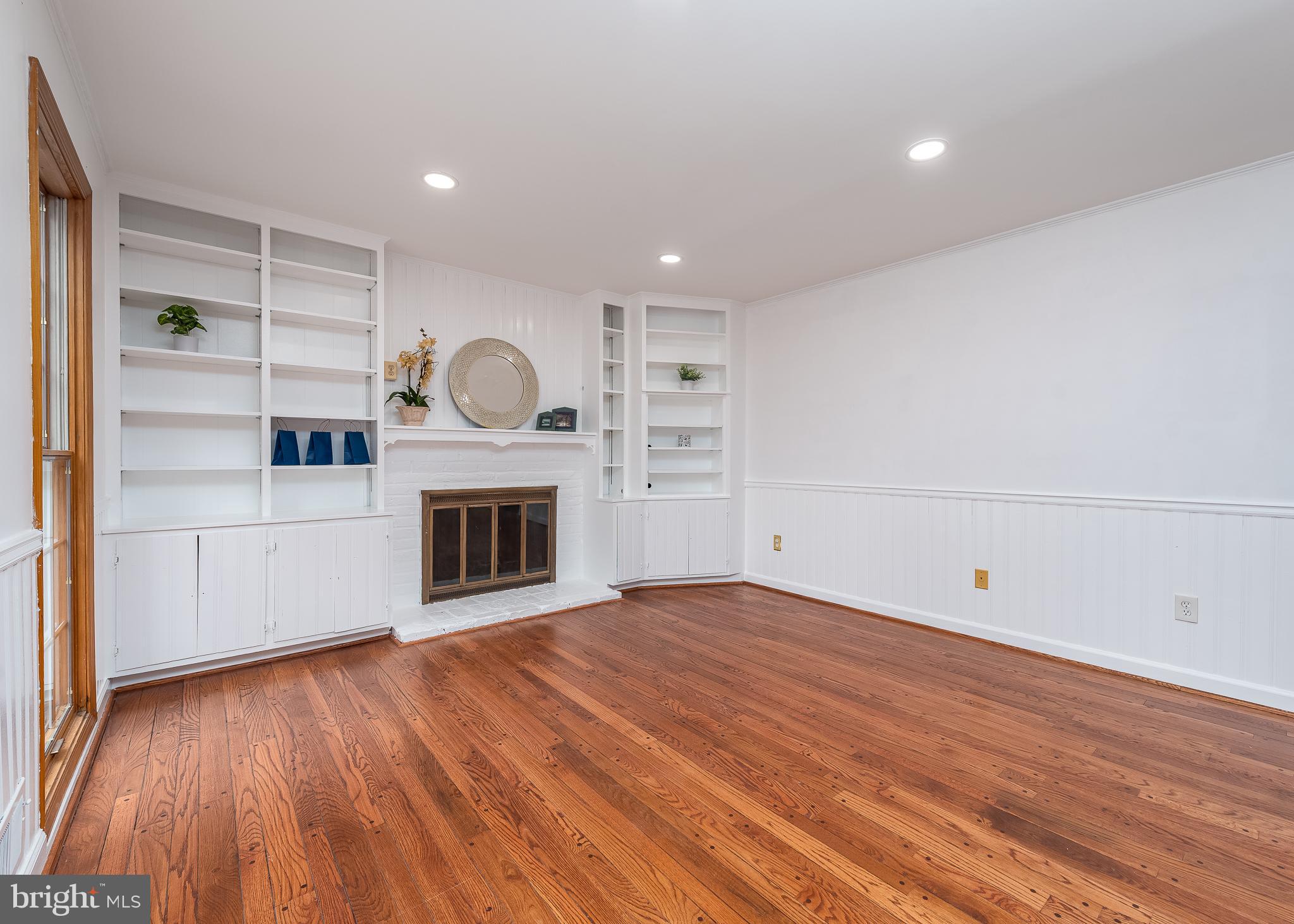 4945 West Running Brook Road Columbia, MD 21044 - Photo 11 of 65 Family Room with Built-in bookshelves