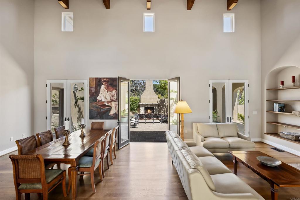 16733 Calle Hermosa San Diego, CA 92127 - Photo 11 of 43 a living room with furniture and wooden floor