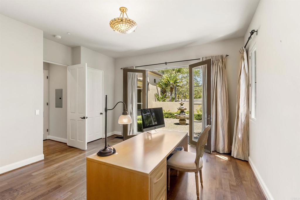 16733 Calle Hermosa San Diego, CA 92127 - Photo 21 of 43 a room with furniture and wooden floor