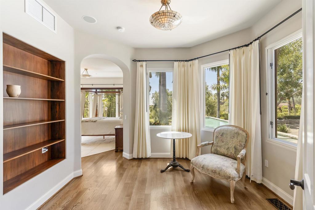 16733 Calle Hermosa San Diego, CA 92127 - Photo 22 of 43 a living room with furniture and a window