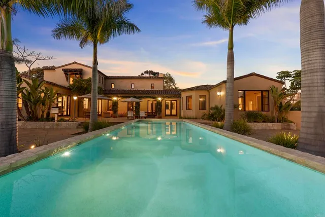 a view of a house with a swimming pool
