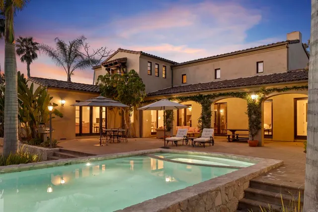 a view of a table and chairs in the patio