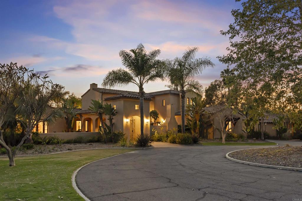 16733 Calle Hermosa San Diego, CA 92127 - Photo 42 of 43 a view of a house with a yard