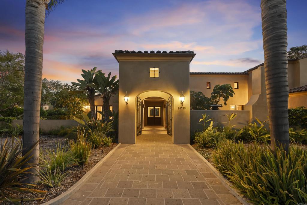 16733 Calle Hermosa San Diego, CA 92127 - Photo 5 of 43 a front view of a house with a yard