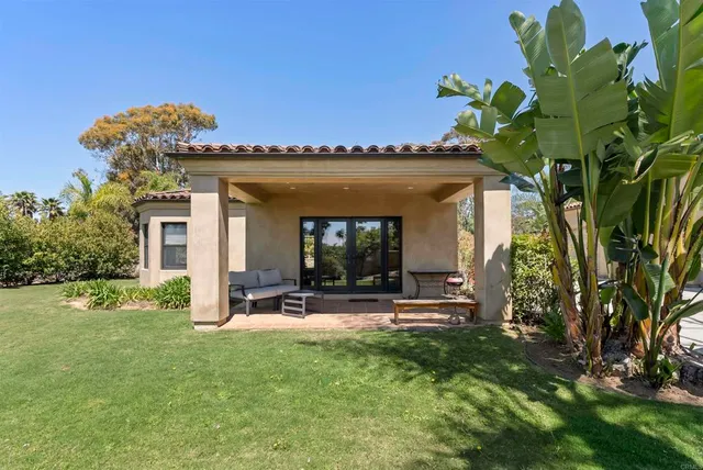 a view of a house with patio