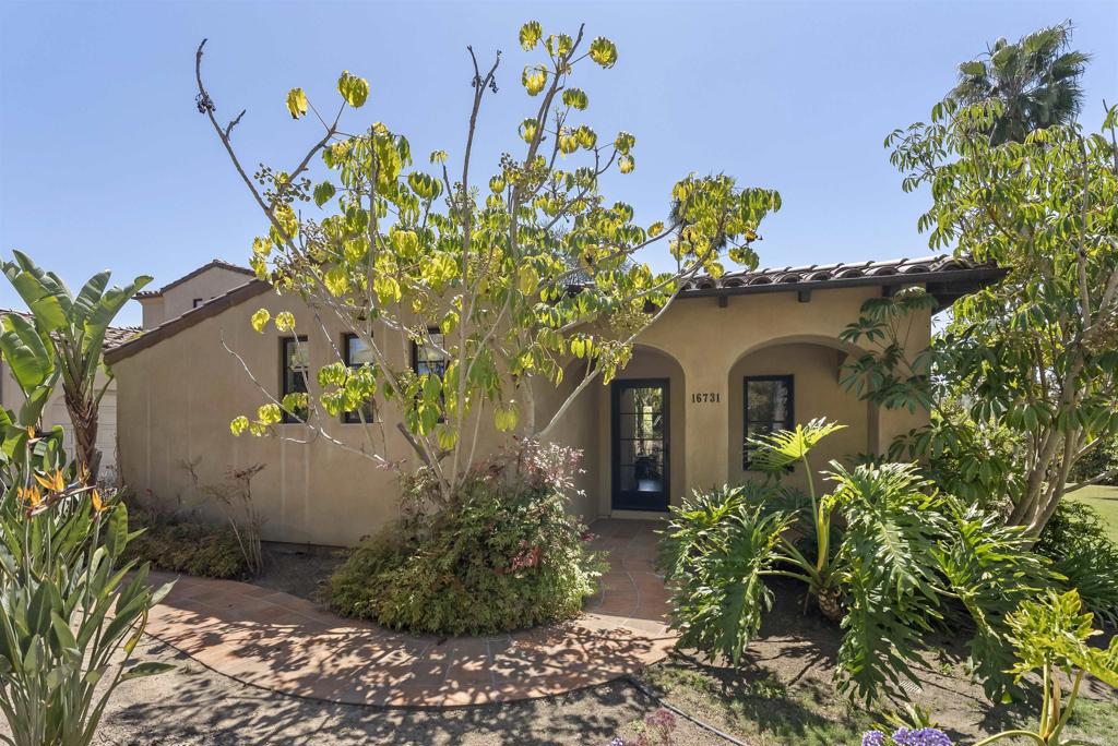 16733 Calle Hermosa San Diego, CA 92127 - Photo 8 of 43 a view of a flower in a garden