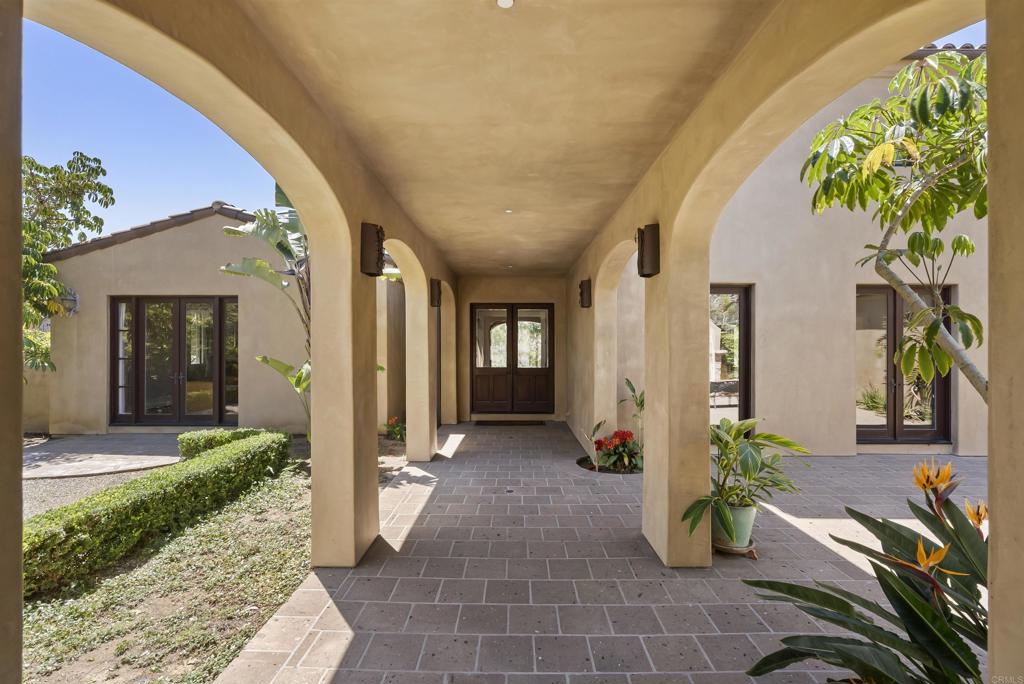 16733 Calle Hermosa San Diego, CA 92127 - Photo 9 of 43 a view of a entryway door of the house