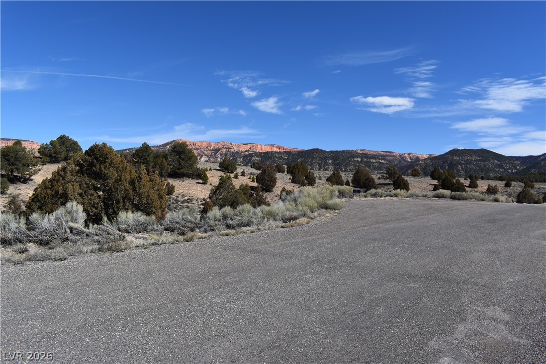 1825 Eagle Ridge Circle Hatch, UT 84735 - Photo 8 of 33 View of asphalt road with a mountain view
