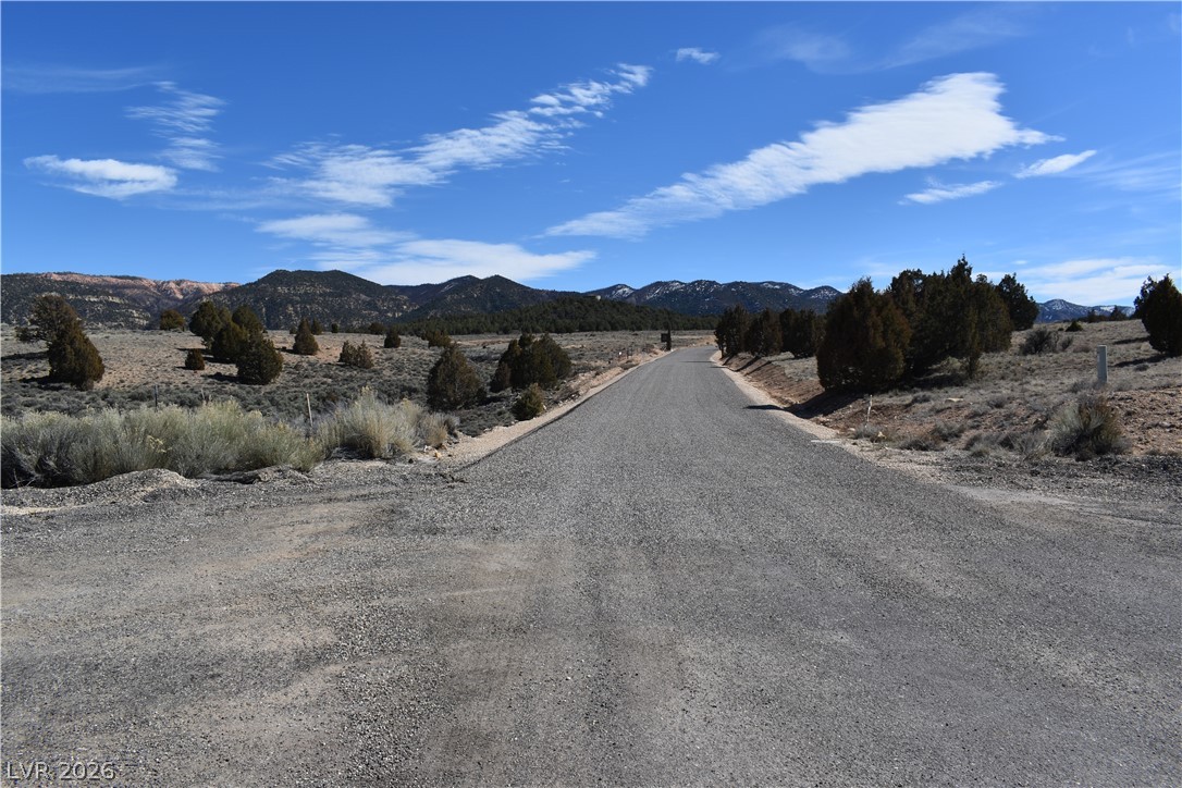 1825 Eagle Ridge Circle Hatch, UT 84735 - Photo 10 of 33 View of dirt / gravel road with a mountain view