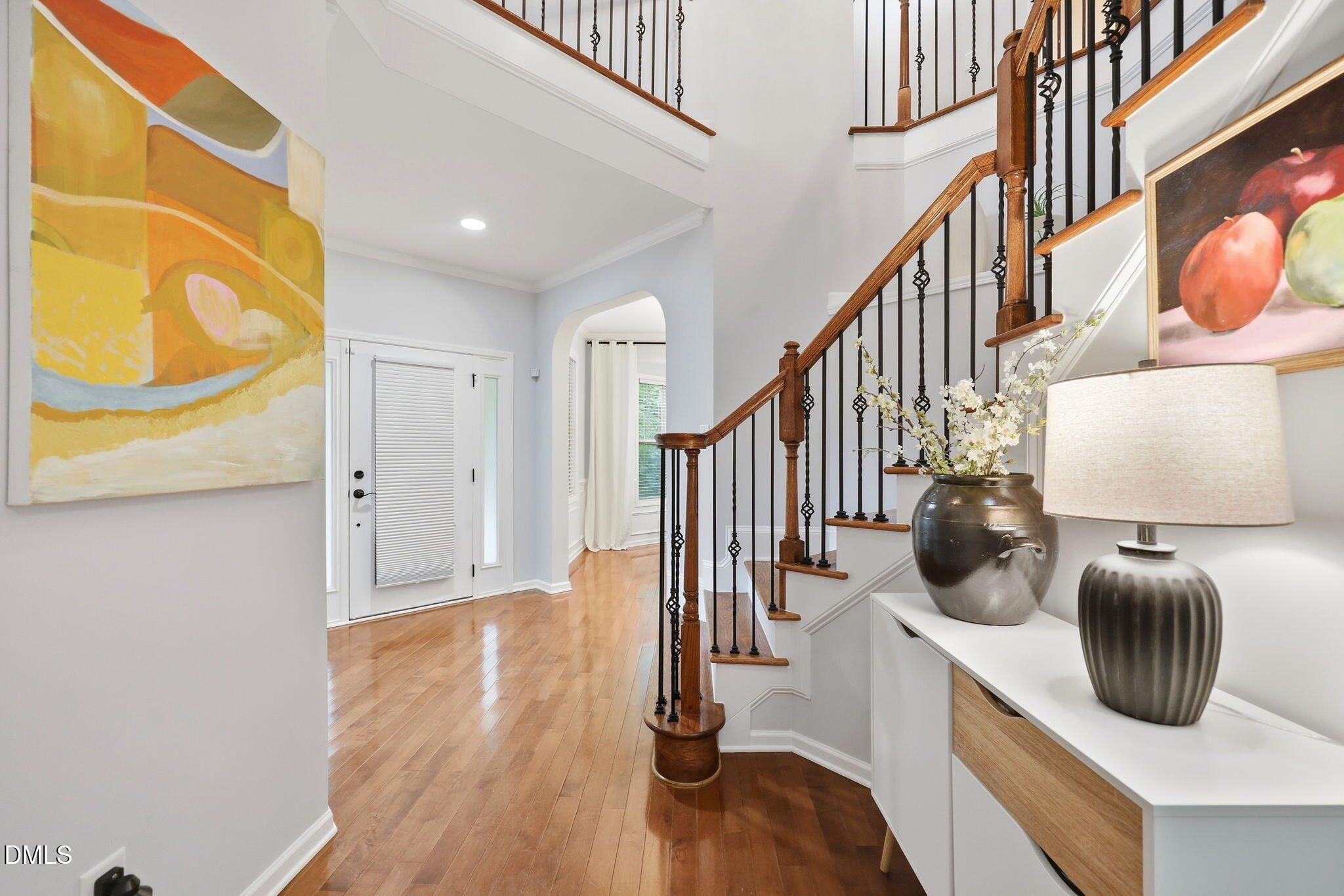 162 Gathering Place Durham, NC 27713 - Photo 7 of 52 a view of entryway and hall with wooden floor