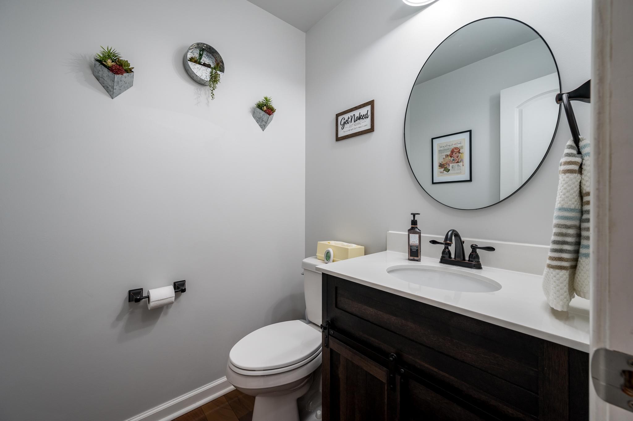 5252 Cainsville Road Lebanon, TN 37090 - Photo 17 of 45 a bathroom with a toilet sink and mirror