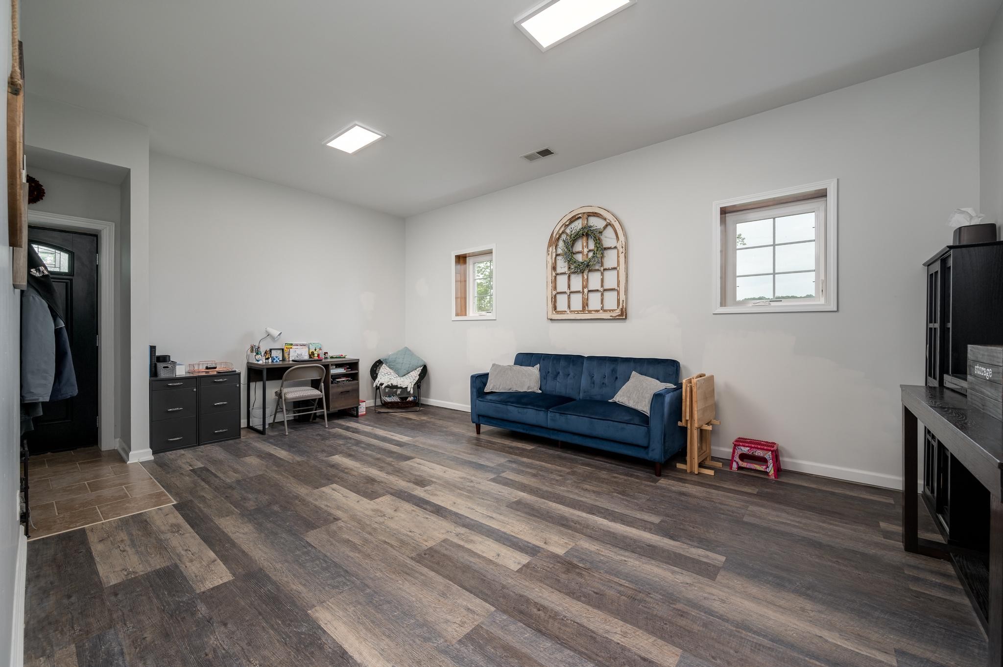 5252 Cainsville Road Lebanon, TN 37090 - Photo 20 of 45 a living room with furniture and a flat screen tv