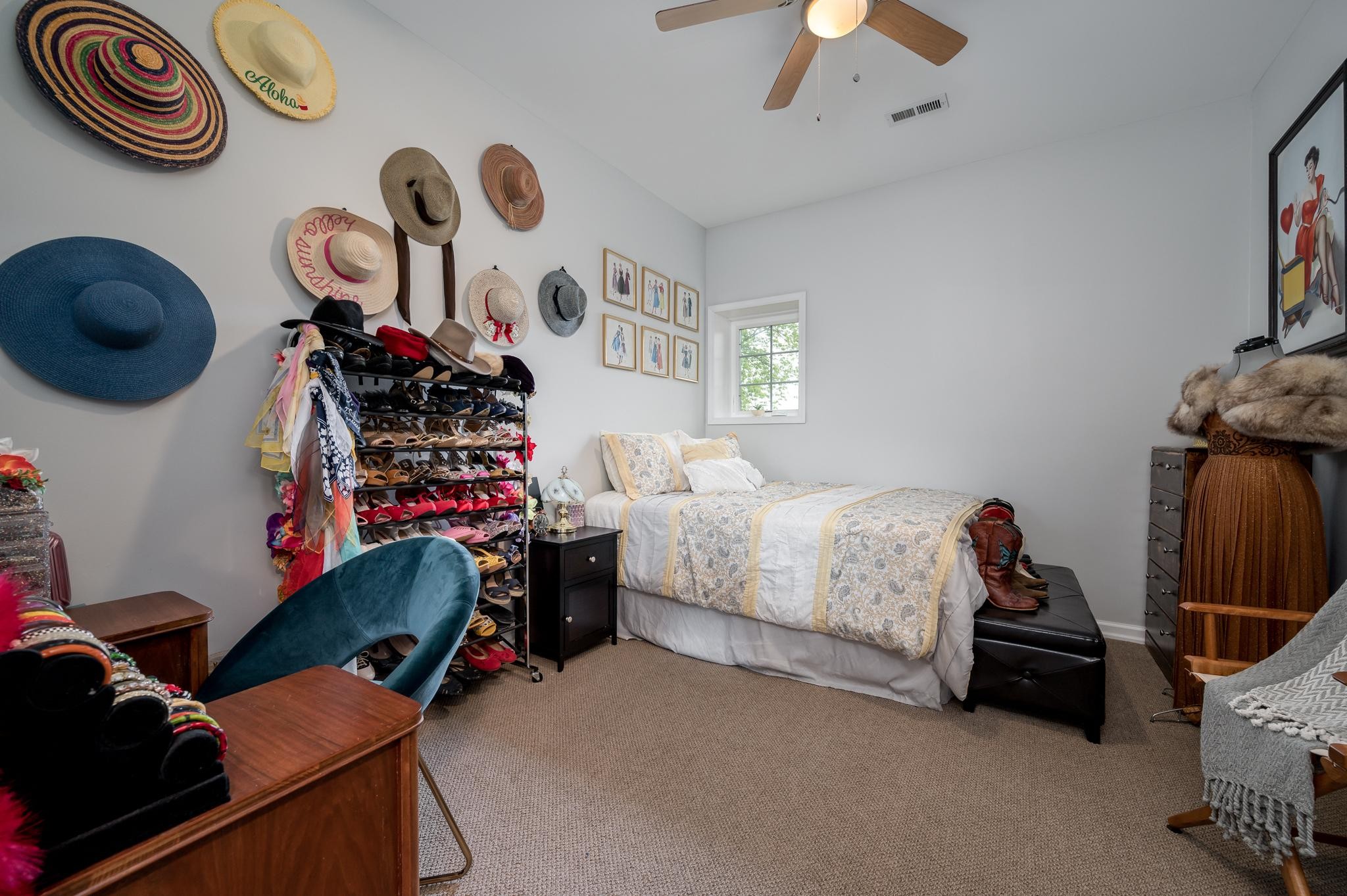 5252 Cainsville Road Lebanon, TN 37090 - Photo 24 of 45 a bedroom with a bed and a chandelier