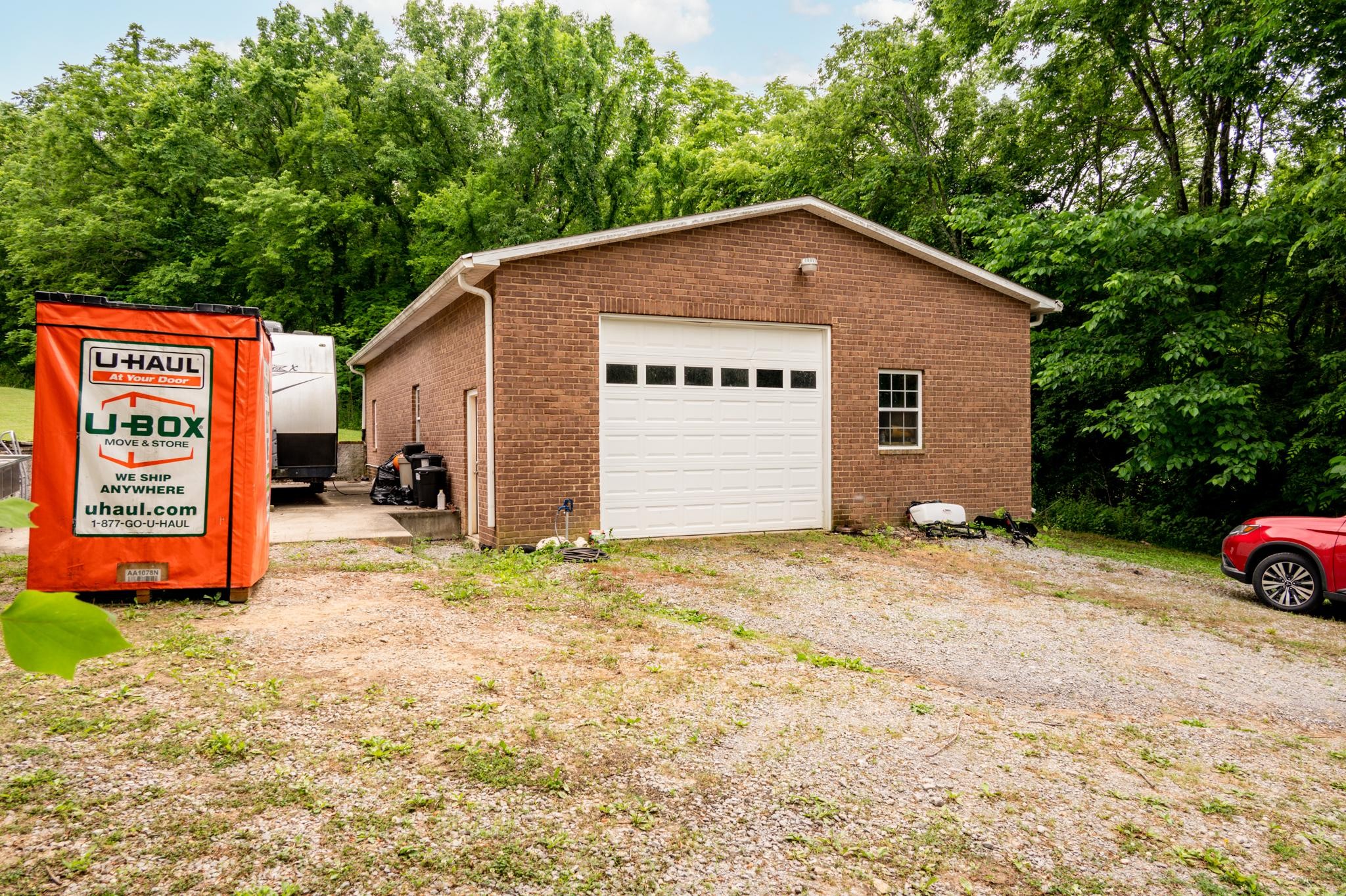 5252 Cainsville Road Lebanon, TN 37090 - Photo 28 of 45 a bedroom with a bed and wooden floor