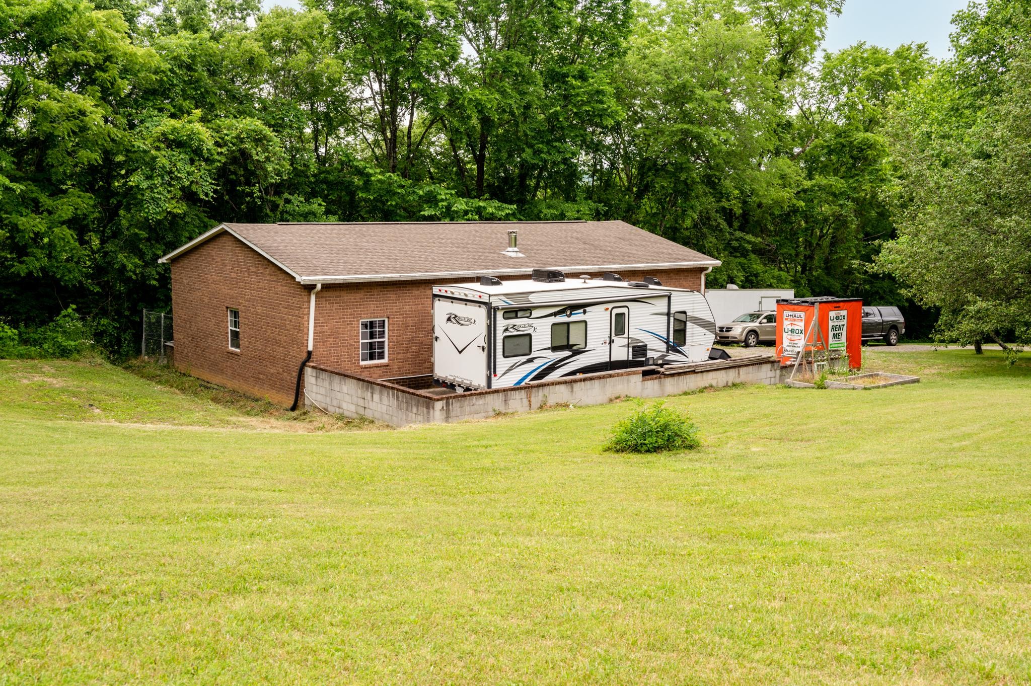 5252 Cainsville Road Lebanon, TN 37090 - Photo 36 of 45 a aerial view of a house with swimming pool and deck
