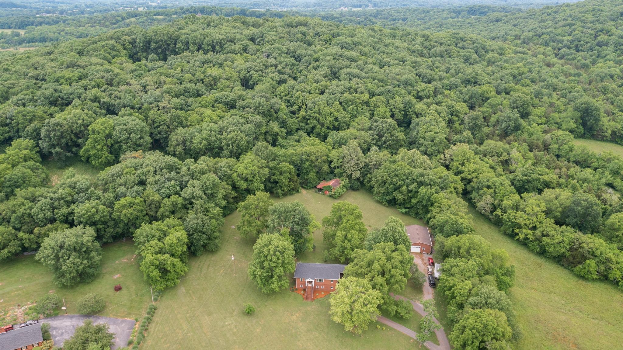 5252 Cainsville Road Lebanon, TN 37090 - Photo 42 of 45 an aerial view of a house with a yard
