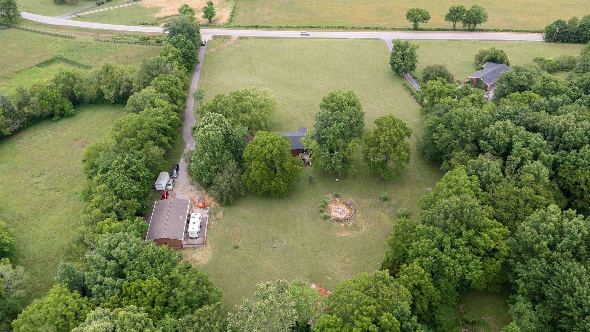 5252 Cainsville Road Lebanon, TN 37090 - Photo 43 of 45 an aerial view of a house with a yard