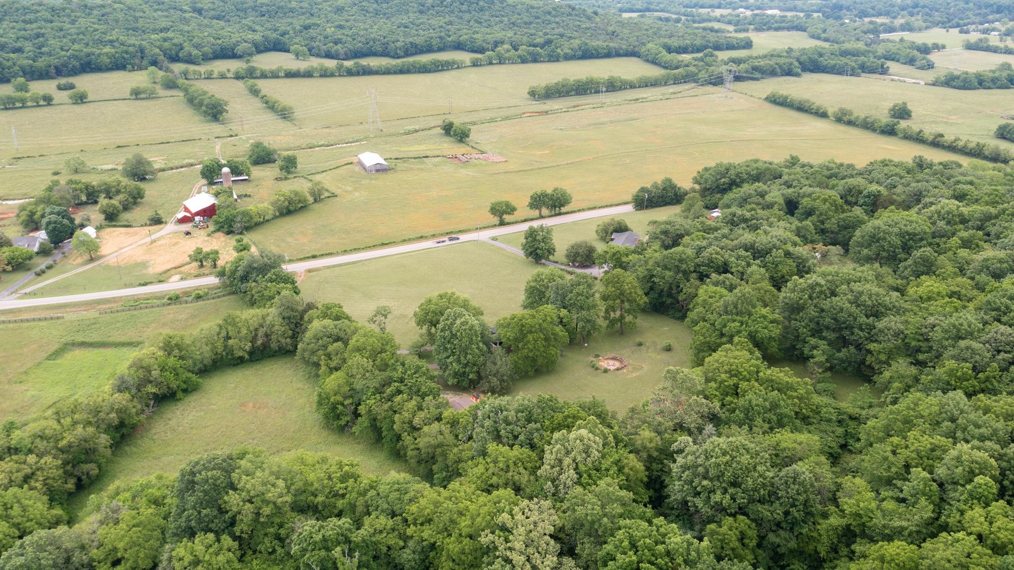 5252 Cainsville Road Lebanon, TN 37090 - Photo 44 of 45 a view of a lake with a yard