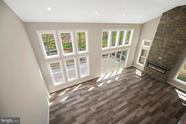 a front view of a house with a yard table and chairs