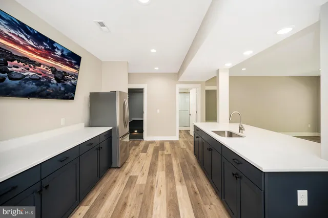 a view of a balcony with wooden floor