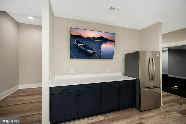 a view of a house with a yard and plants