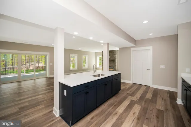 an aerial view of a house with yard swimming pool and outdoor seating