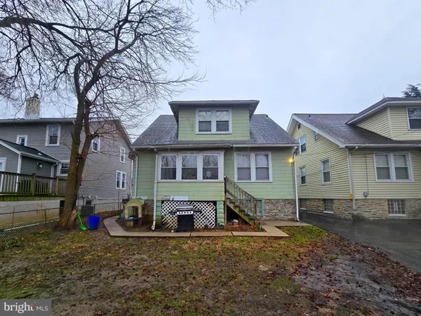 a front view of a house with yard