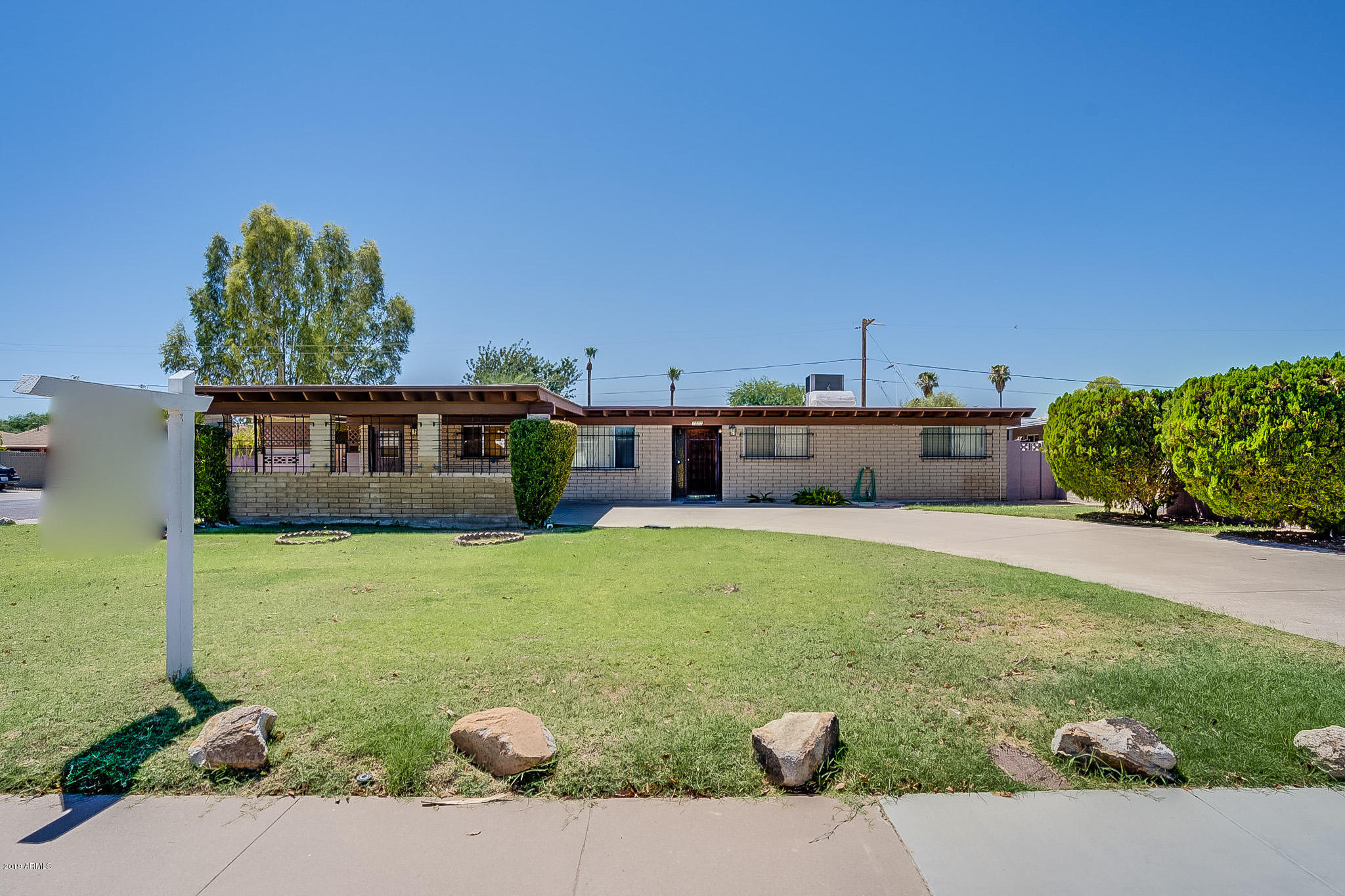 3601 West Griswold Road Phoenix, AZ 85051 - Photo 1 of 40 a outdoor view with a seating space