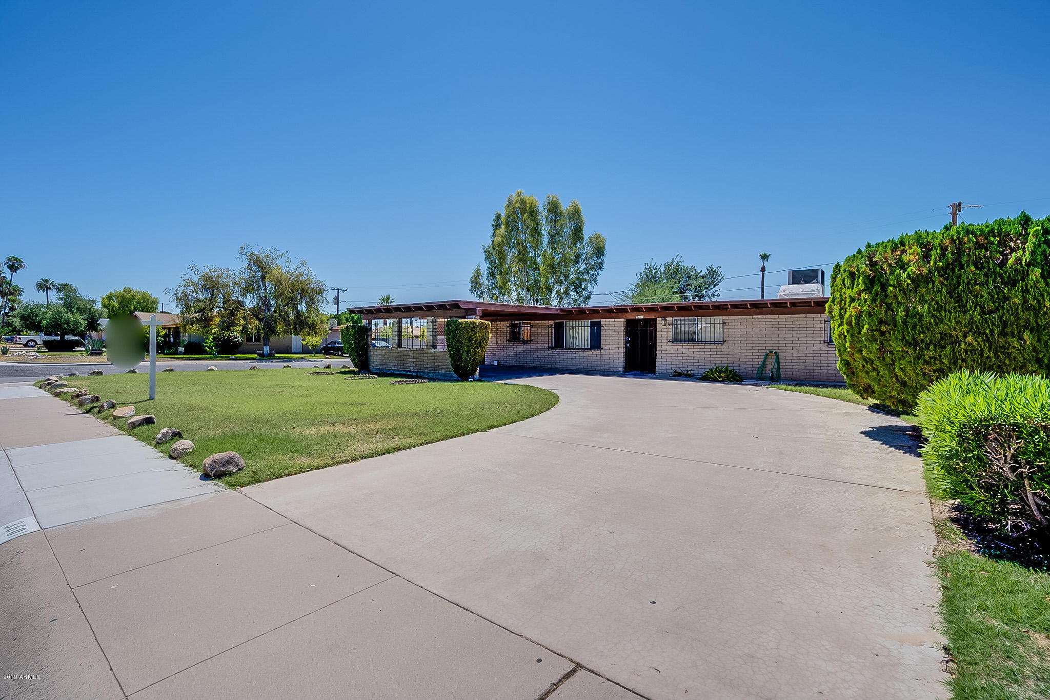 3601 West Griswold Road Phoenix, AZ 85051 - Photo 3 of 40 Front from Side