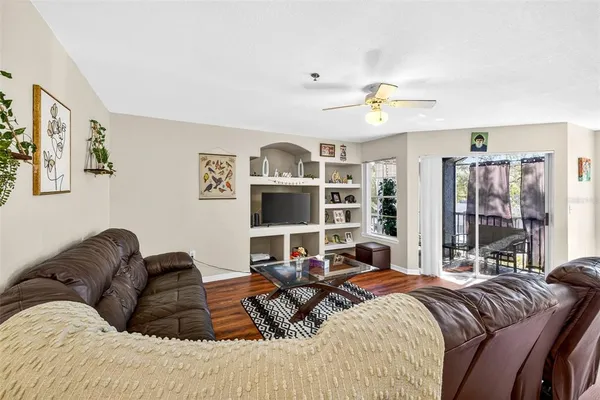 a bed room with a bed window and couch