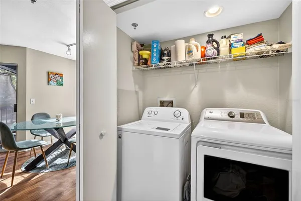 a utility room with dryer and washer