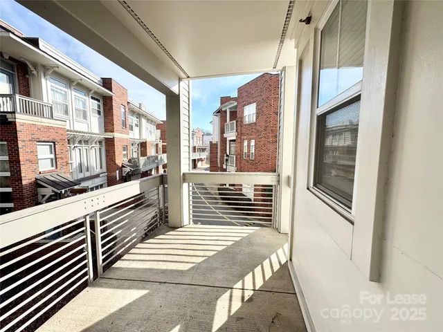 a view of a city from a balcony