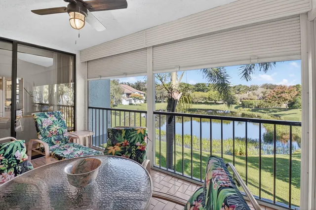 a view of a porch and patio with couches