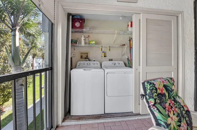 a utility room with dryer and washer