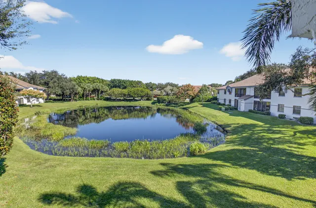 a view of a lake with a big yard