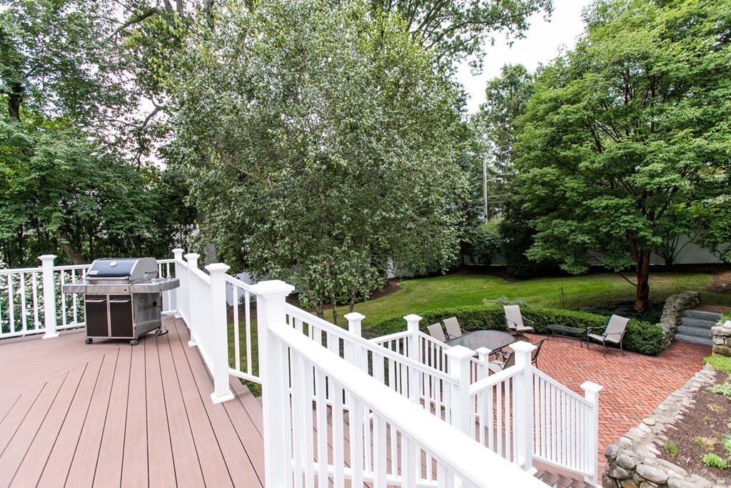 134 Edmunds Road Wellesley, MA 02481 - Photo 28 of 29 a view of a deck with furniture and garden