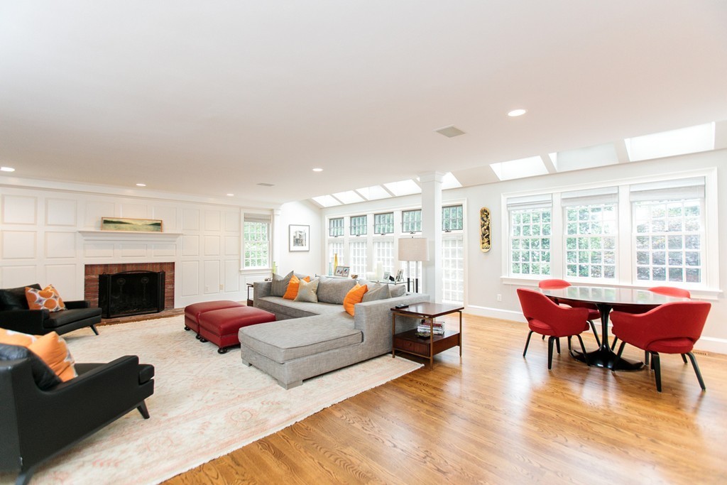 134 Edmunds Road Wellesley, MA 02481 - Photo 4 of 29 a living room with furniture a fireplace and a table