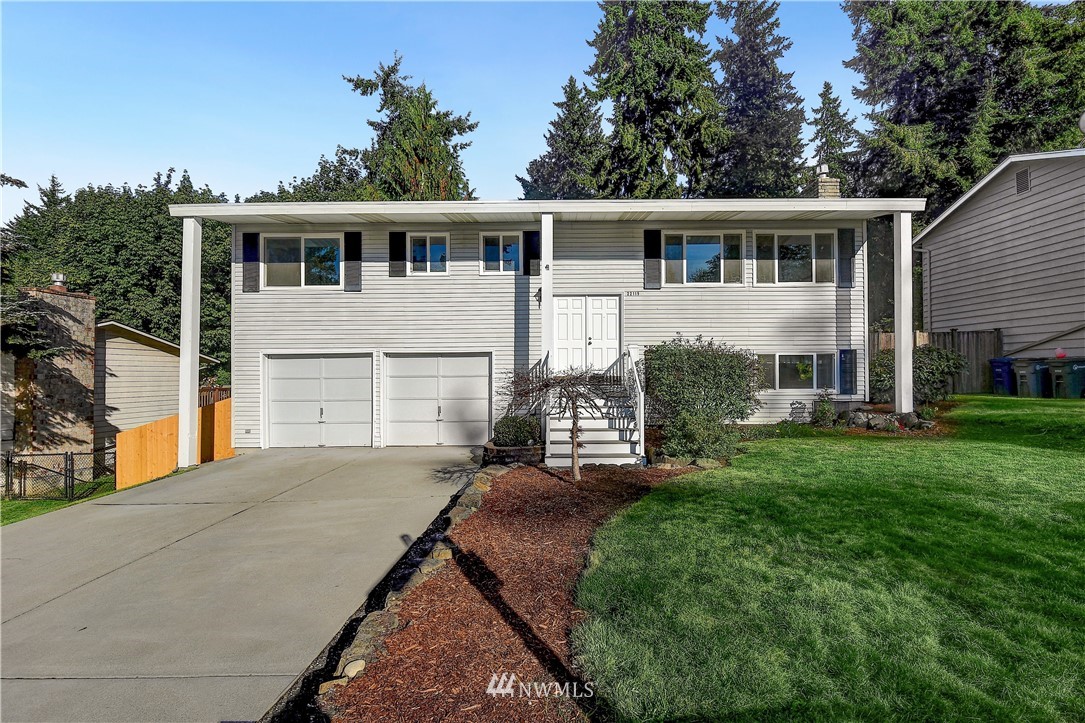 22119 Meridian Avenue South Bothell, WA 98021 - Photo 1 of 17 a view of a house with backyard and sitting area