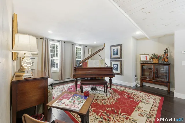 a bed room with a bed and a couch